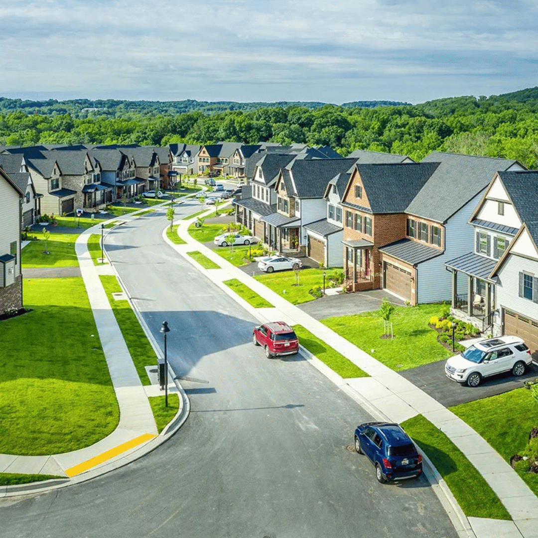 Residential neighborhood surrounded by wooded hills in the Texas Hill Country