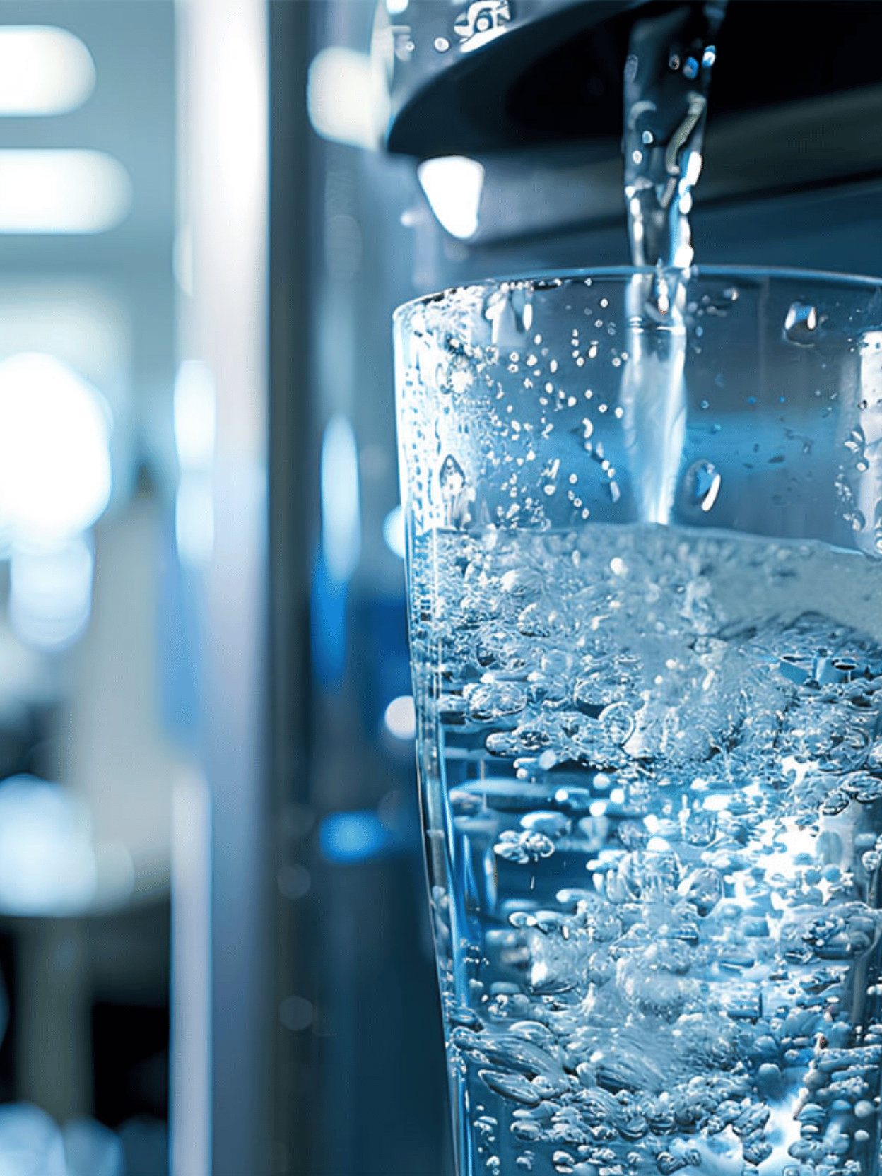 Clear filtered water filling a drinking glass for reverse osmosis water evaluation